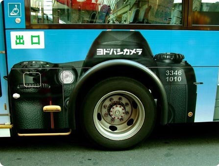 autobus publicidad cámara de fotos